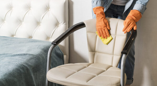 front-view-woman-cleaning-chair